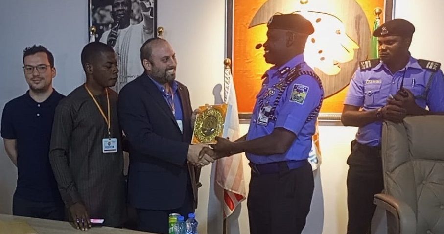 Cyber Intelligence's CEO and Co-Founder Receiving a Plaque of Honor from the Nigeria Police